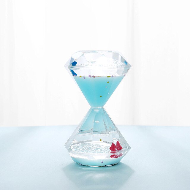 Divertido arena ceremonia clásico Reloj de escritorio lindo de dibujos animados muñeca de líquido reloj de arena de aceite de movimiento para los niños: Blue
