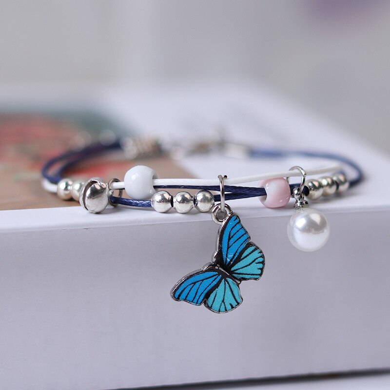 Brazalete con mariposa colgante separador con Perla azul para mujer y niña, PULSERAS CON ABALORIOS de estrellas, cadena para la muñeca, cadena ajustable con cierre de langosta: A