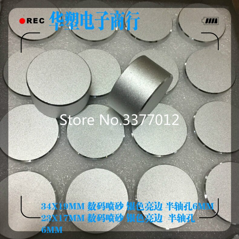 Silver sandblästring ljus sida (halva skaft) aluminiumlegeringsratt bilnavigeringsvolym justering cd kodarlock 34 x 19mm