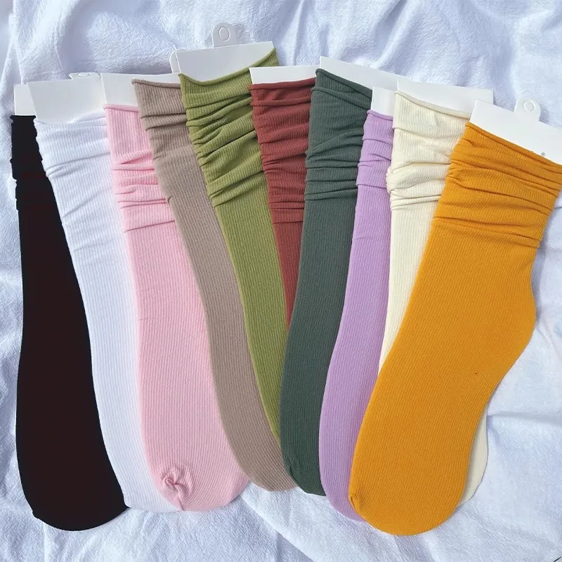 Kvinnor färgglada lösa noppfria strumpor stickade ribbade istunna vårsommar damstrumpor höga tubstrumpor streetwear college-stil strumpa