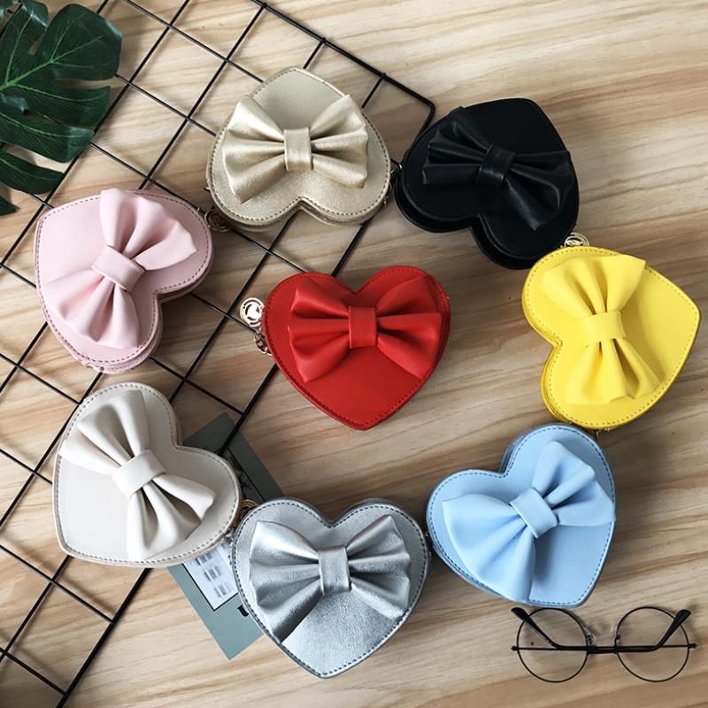 Baby Girls Cute Bow Handbags Heart Shaped Shoulder Bag Solid Color Crossbody Bags Small Purse PU Leather