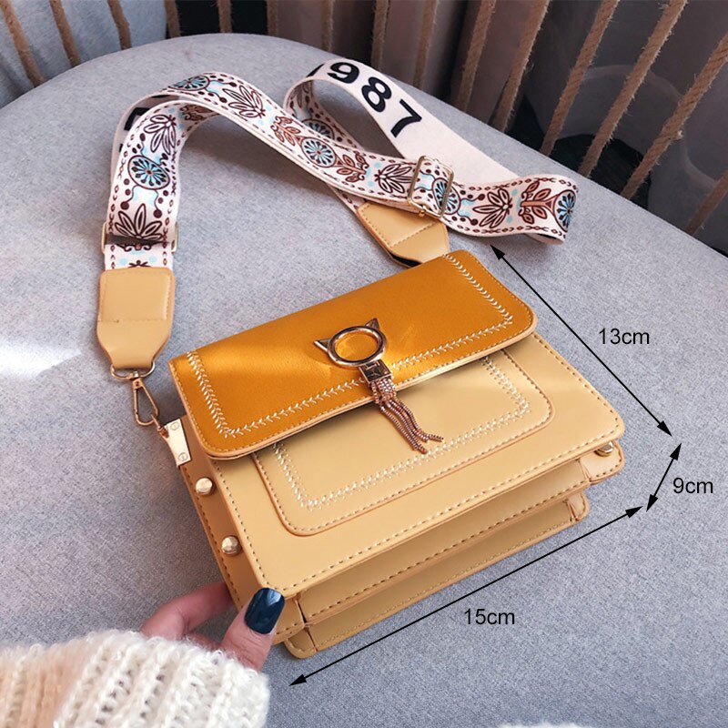 2020 novo couro do plutônio sacos de ombro designer feminino franja gato fivela alça larga bolsas bolsas moda feminina crossbody saco