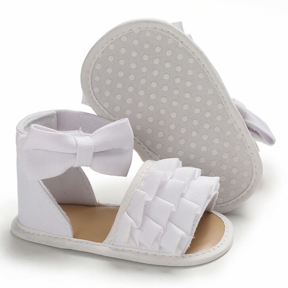 Moda infantile Del bambino Della Ragazza Morbida Suola Dei Sandali Del bambino di proprietà Scarpe arco-Nodo Sandalo