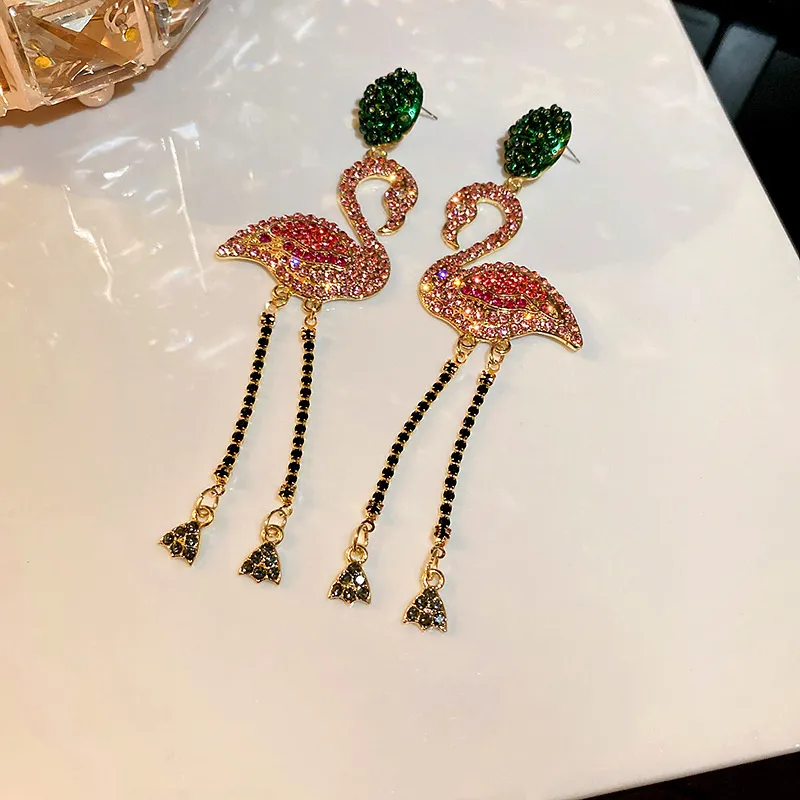 Roze oorbellen met vogeltjes en kristallen voor dames, sieraden met lange kwastjes en strass steentjes, statement sieraden.