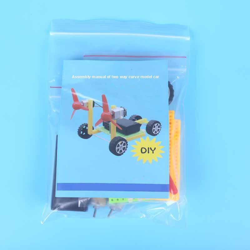 Kinderen DIY wetenschap en technologie kleine productie elektrische wind auto basisschool studenten handmatige bediening Wetenschap Expe