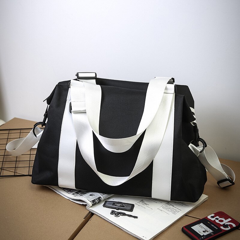 Borsa da uomo nuova borsa da viaggio in stile coreano bagaglio da viaggio Versatile portatile di grande capacità 2022 nuovo: Black