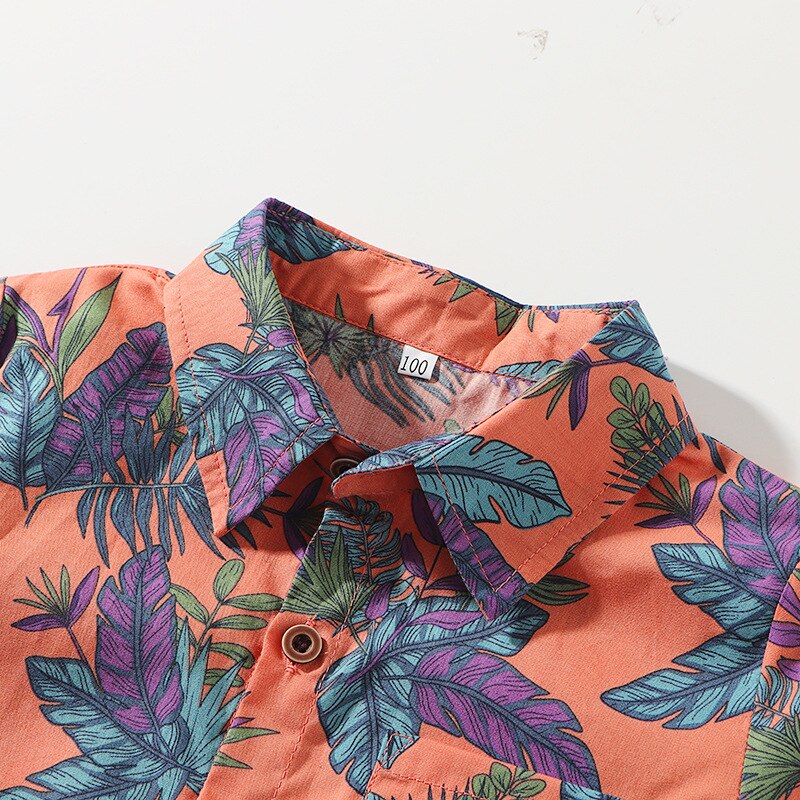 Camisas curtas da luva dos meninos da criança, folhas tropicais imprimiram as camisas dos botões do pescoço da lapela