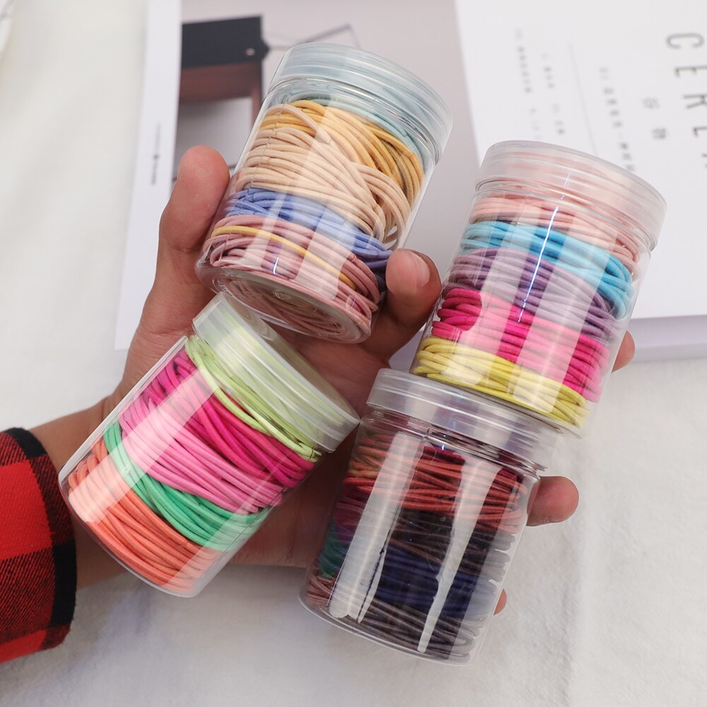 Gomas elásticas de goma para el pelo para niñas y mujeres, gomas finas de colores de 2MM de grosor, accesorios básicos para el cabello, goma bonita para el pelo, botella de 4CM, 100 Uds.