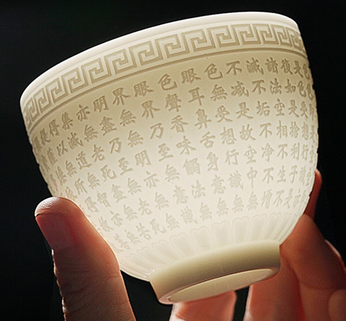 A single cup of office for tea pottery and tea sets made of mutton fat and jade heart by Longfeng Baifu