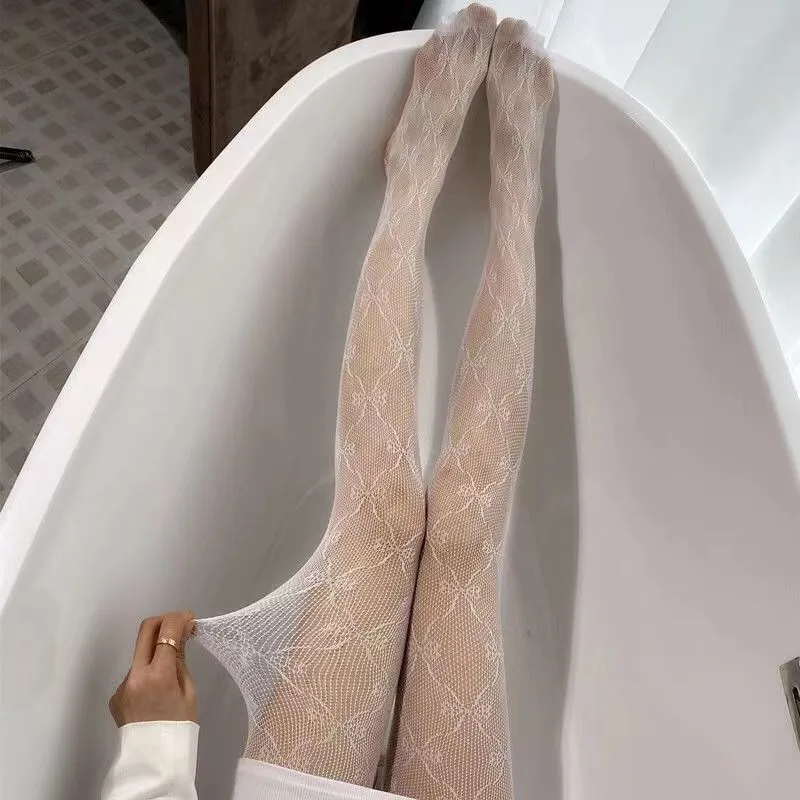 Nuevas medias bordadas de malla con lazo, pantimedias inferiores para mujer, medias sexis de nailon con lazo, medias caladas de estilo Punk a la