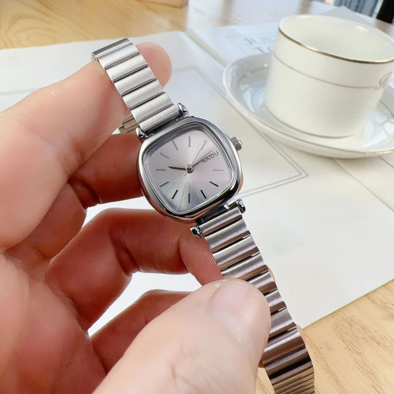 Dameklokker relogio feminino luksuriøs sølvfarget klokke dame stålrem kvarts armbåndsur klokke reloj mujer: Bronse