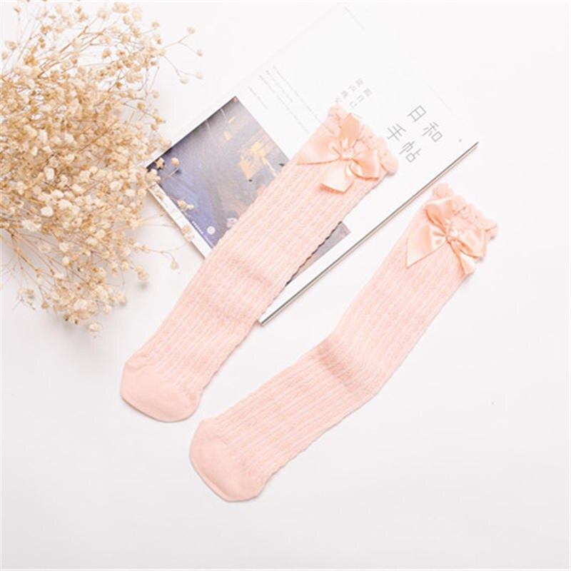 Babymeisjessokken meias infantil knie schattige baby lange slofjes kinderen gestreepte sokken kinderen kniehoog met strikken prinsessensokken: Oranje