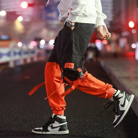 Hombres suelta ropa informal estilo Hip hop coreano pantalones Harem con bolsillo pantalones de tobillo de longitud de remiendo Casual Cargo pantalones de chándal