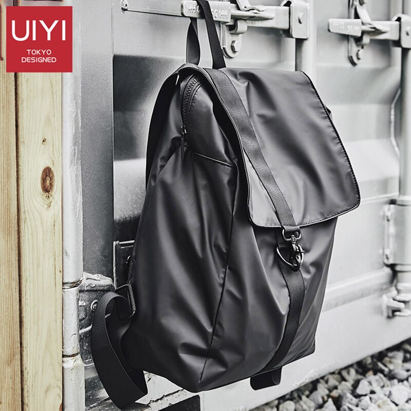 UIYI mochila dos homens Coreano couro PU + PVC 14 polegada laptop escola mochila grande capacidade à prova d' água anti-roubo bolsa de viagem saco