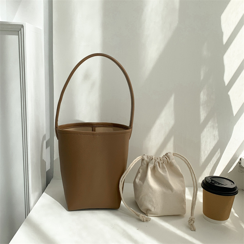 Bolso casero para mujer, bolso Retro de cuero suave portátil 2025, bolso de cubo que combina con todo, bolso de hombro para ir al trabajo, bolsos y bolsos