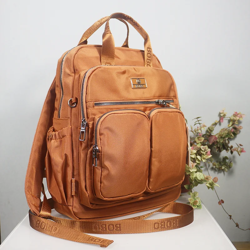 Zaino da viaggio per donna Borsa da scuola ad alta capacità Borsa per laptop leggera e impermeabile Zaino da cabina con tasche multiple per uomo: Avorio