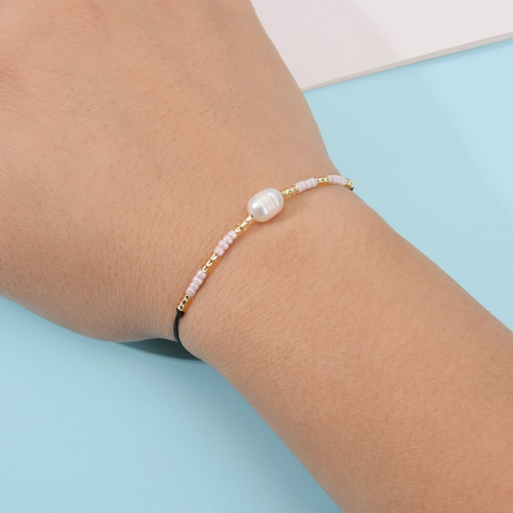 Romantico 12 pz/lotto Perla Pendenti E Ciondoli Braccialetto impostato per Le Coppie Della Ragazza Delle Donne Della Maglia Regolabile Nodo Stringa di semi di Perline Braccialetto Dei Monili del Regalo