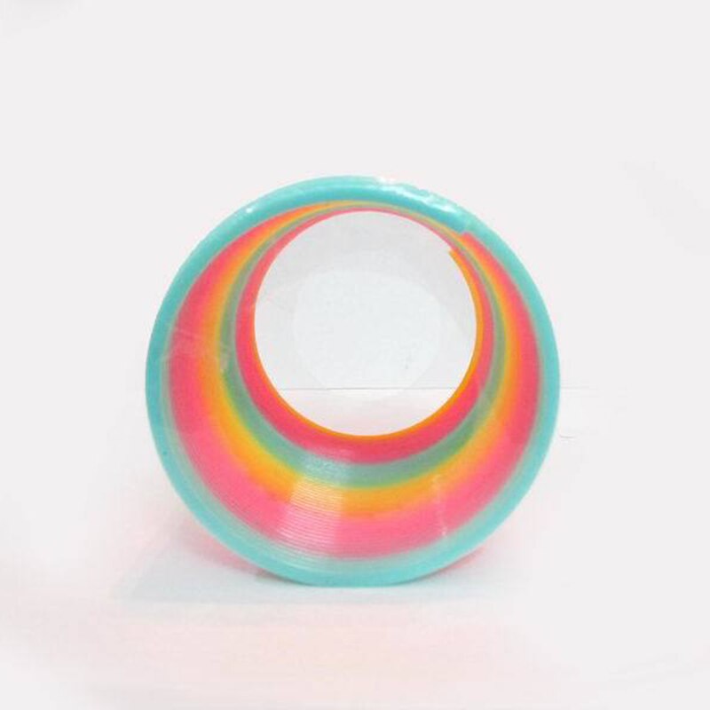 10 pz/impostato anti-fatica Magia di Sorriso di Plastica Arcobaleno Primavera Cerchio Colorato Bobina Elastico Anello di Giocattoli Educativi per I Giochi per Bambini