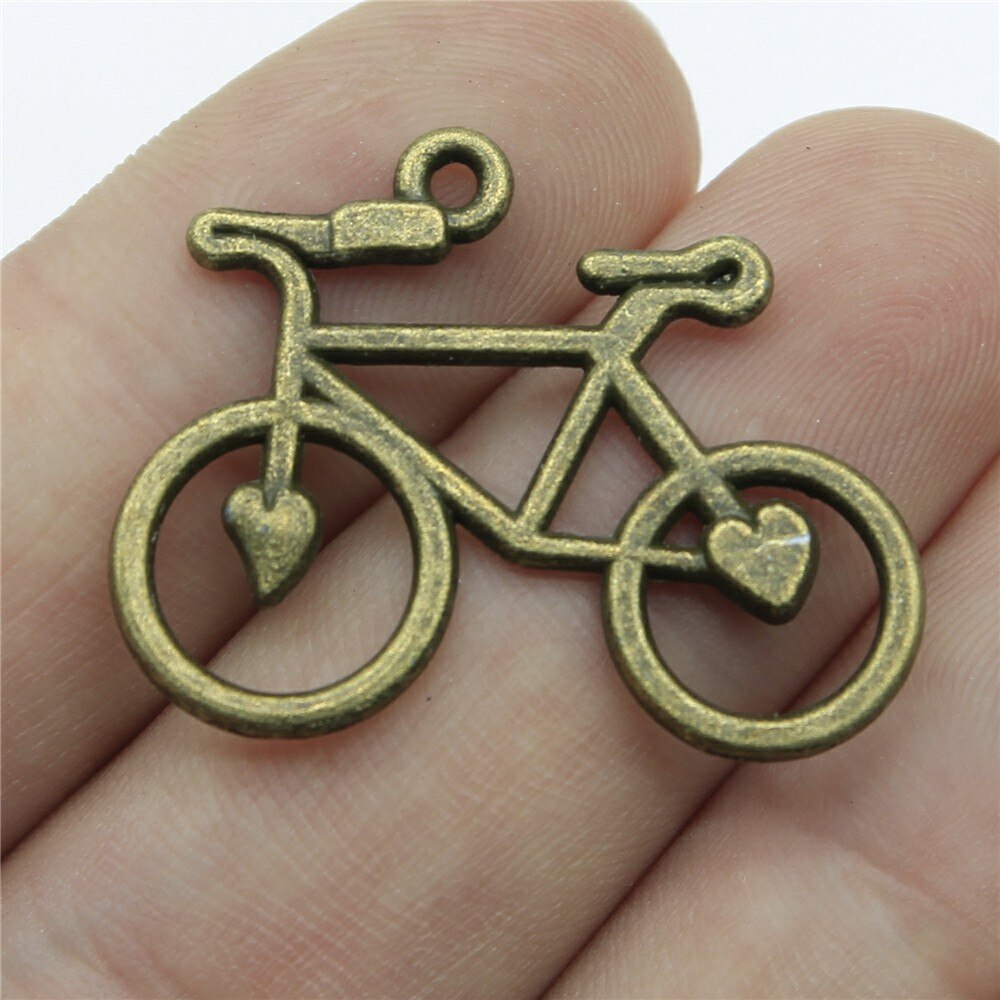 Wysiwyg 10 stk 31 x 23mm 3 farver antik guld antik sølvfarve antik bronze cykel charme cykel vedhæng cykel charme: Antik bronze belagt
