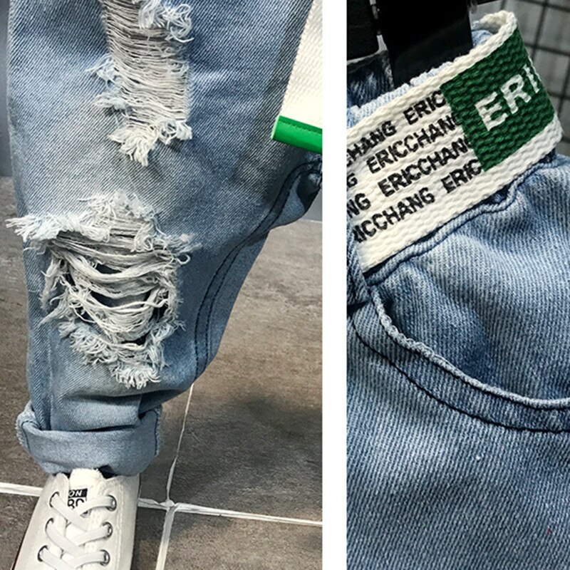 DFXD Jeans per ragazzi autunno moda cotone elastico in vita Jeans strappati pantaloni pantaloni lunghi in Denim con foro rotto pantaloni senza cintura 2-7 anni