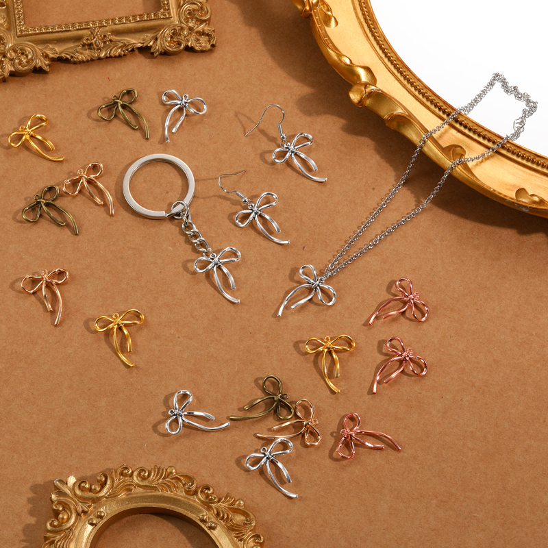 20 sztuk 5 kolorów mała kokardka węzeł Charms na bransoletkę naszyjnik wisiorek tworzenia biżuterii rękodzieło diy materiały 20*25mm N1177