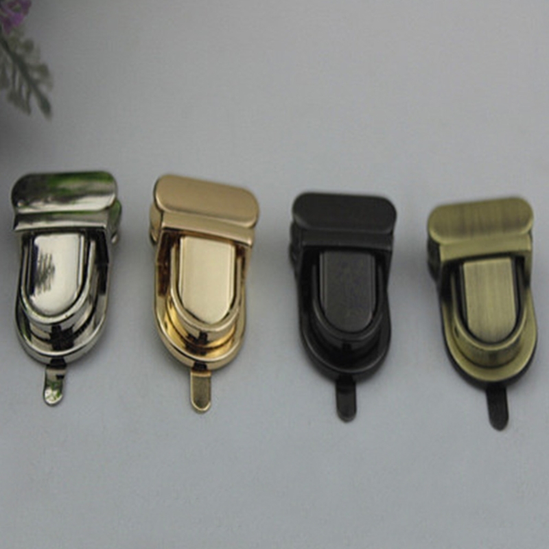 Holdbart spænde twist lock hardware til taskeformet håndtaske diy turn lock taske lås tungelås
