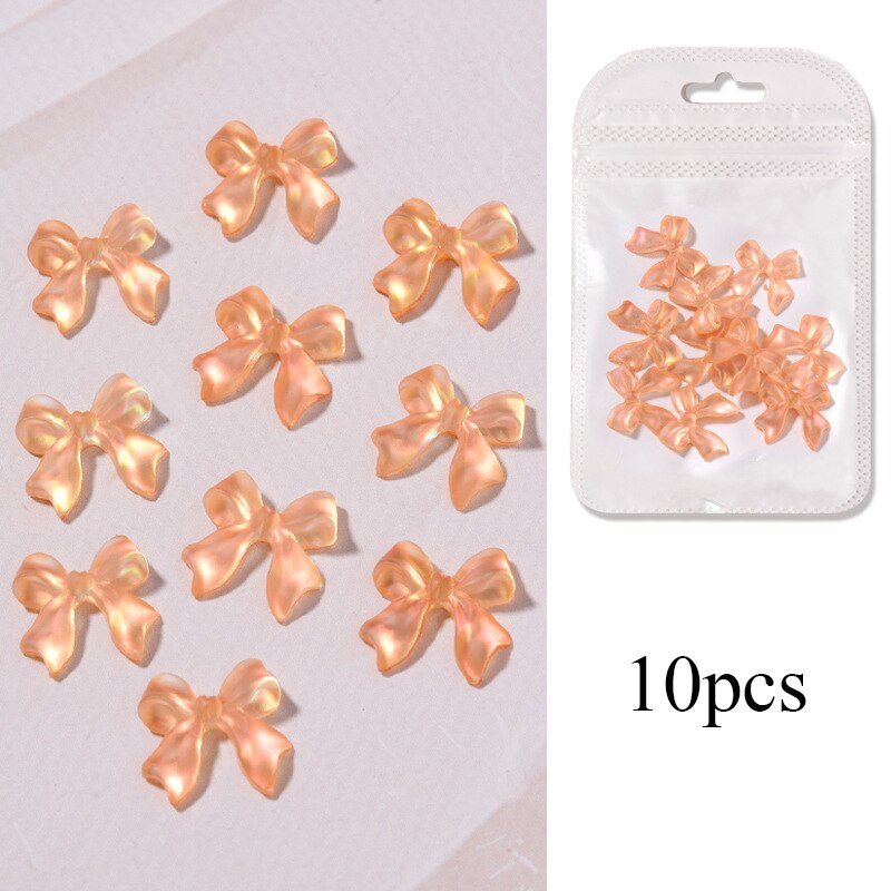 10 stk/pose blanding farger 3d nordlys sløyfer spiker rhinestones diy dekorasjon negle krystall smykker bånd sommerfugl manikyr tilbehør: Oransje