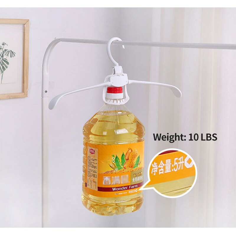 Perchas creativas plegables para almacenaje de ropa y guardarropa organizador de guardarropa percha gruesa de plástico con un botón para encogimiento de ropa