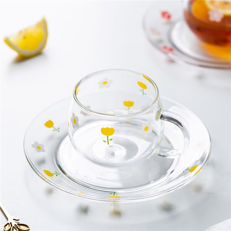 Japansk genomskinlig blomma glas mjölkkopp med sked och fat set kaffe frukost mugg dessert tallrik söt enkel tekopp
