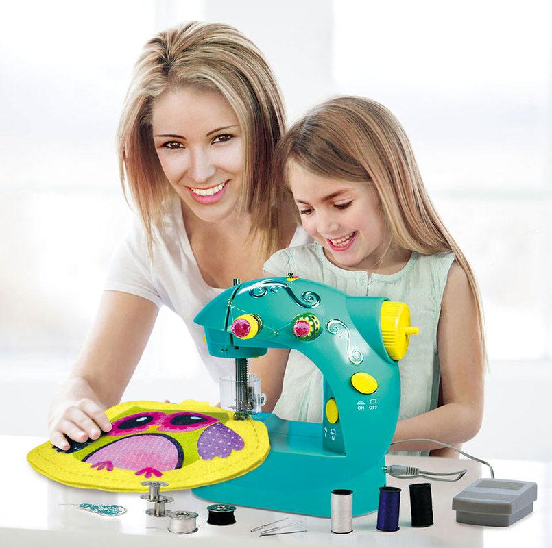 Máquina de coser eléctrica pequeña portátil para niños pequeños, fábrica de máquinas de coser para niñas
