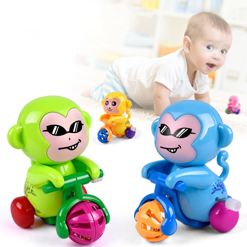 2022 New 1pcs Creative Children Clockwork Toy Novelty Cartoon Winding Winding Small Toy Winding Mini Gift: monkey riding a bike