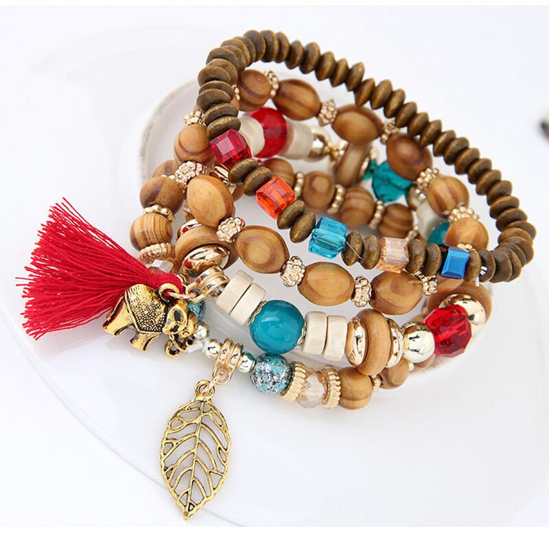 Europese en amerikaanse retro sieraden etnische log kralen kwast baby olifant blad stretch armband set vrouwelijke armband voor vrouwen: Bruingeel
