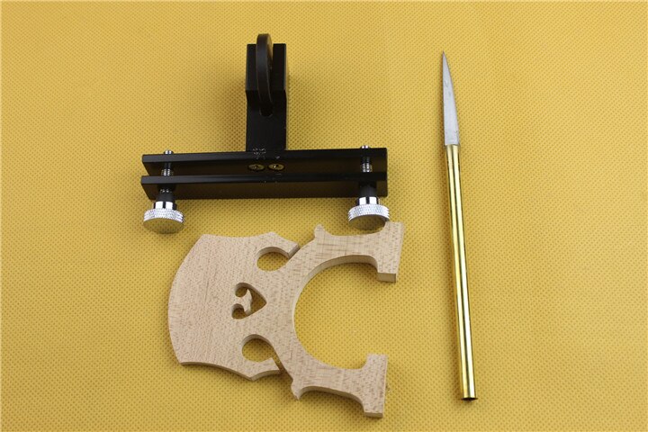 A Piano Playing Code Tool, a Cello Code Cutter, a Grinder Code, a Set of Various Tools for Violin Making.