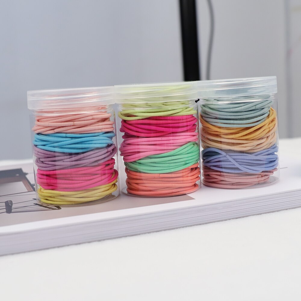 Gomas elásticas de goma para el pelo para niñas y mujeres, gomas finas de colores de 2MM de grosor, accesorios básicos para el cabello, goma bonita para el pelo, botella de 4CM, 100 Uds.