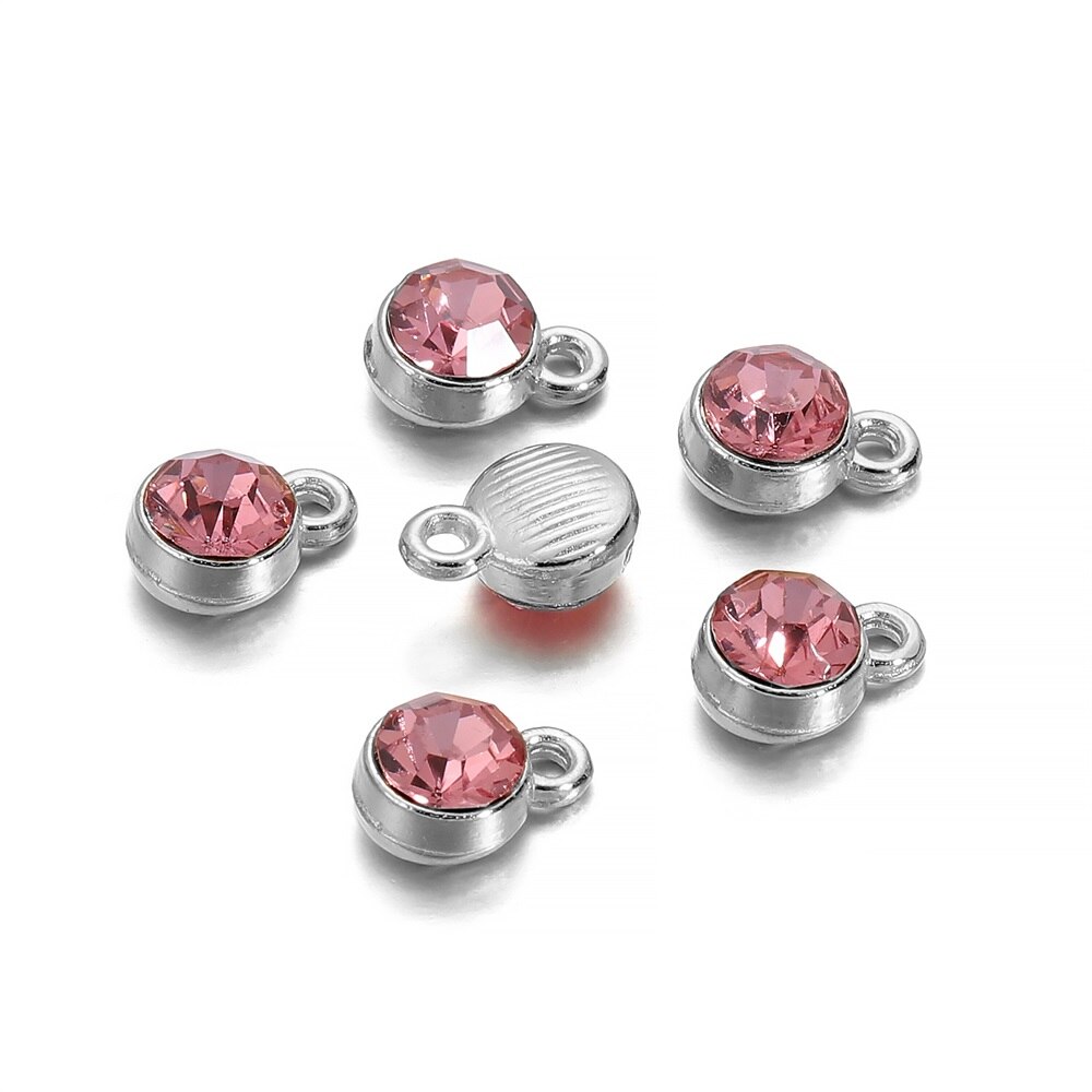 Oorbellen met Juli Geboortesteen Kopen? Gratis verzending - KAYA Sieraden