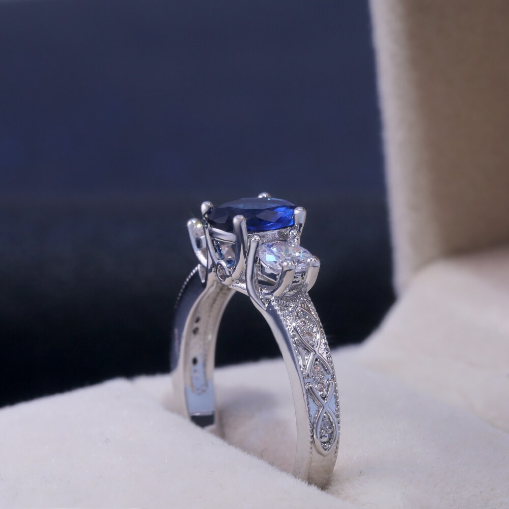 Huitan ovale bleu pierre bague de mariage de luxe Triple cristal pierre broche réglage avec motif de luxe bande femmes bijoux bague