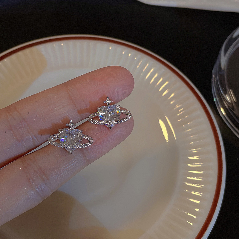 Luxe zilverkleurige oorbellen met grote plant en glinsterende zirkonia steentjes, geschikt voor dames, koreaanse oorbellen.