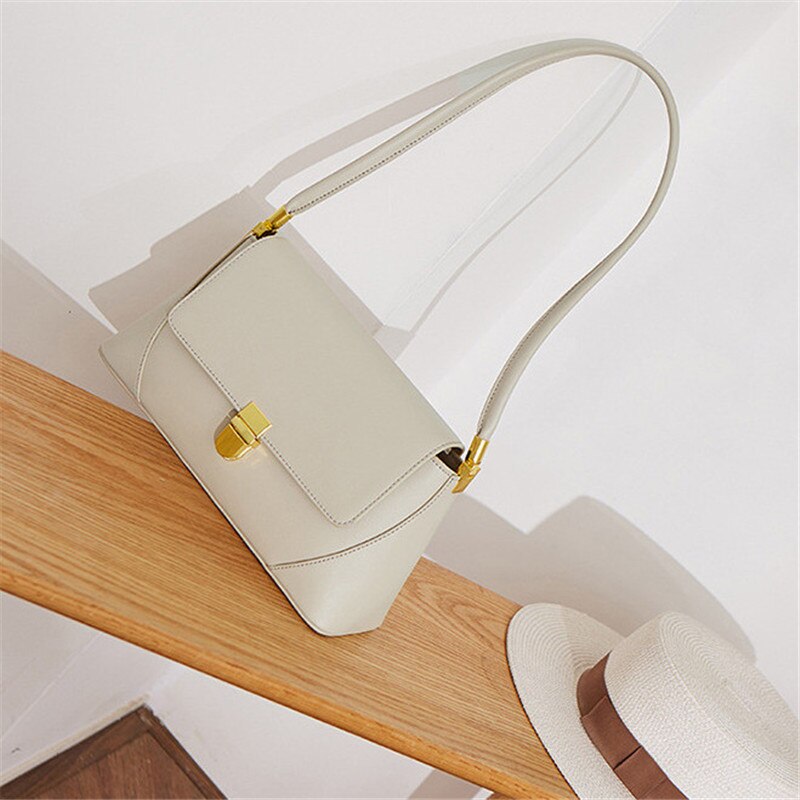 And Simple Solid Color Cowhide Bag Armpit Retro Minority Dharma Stick Women's Bag Portable Shoulder Bag: white