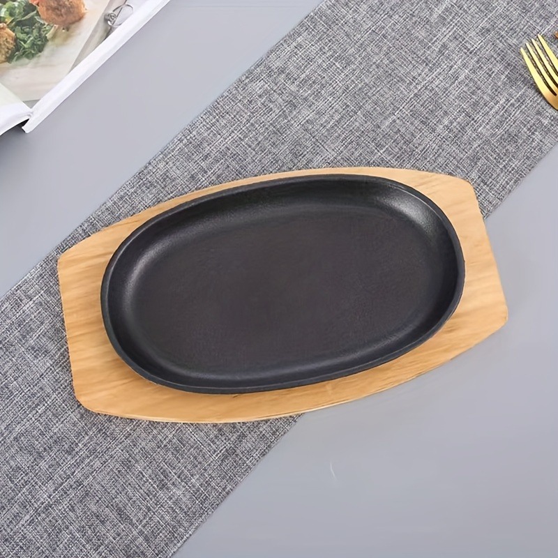 A three in one cast iron baking tray Iron plate cast iron oval steak pan Home gas barbecue, grilled fish dish