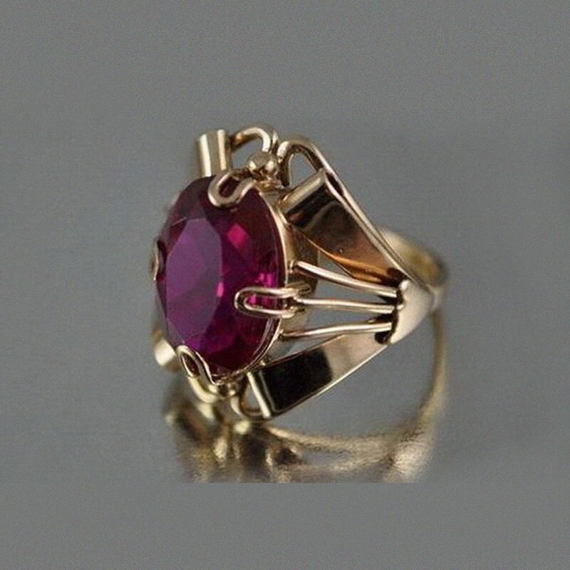 Eleganter Ring mit geschichtetem rotem Kristall und Gold main image 0