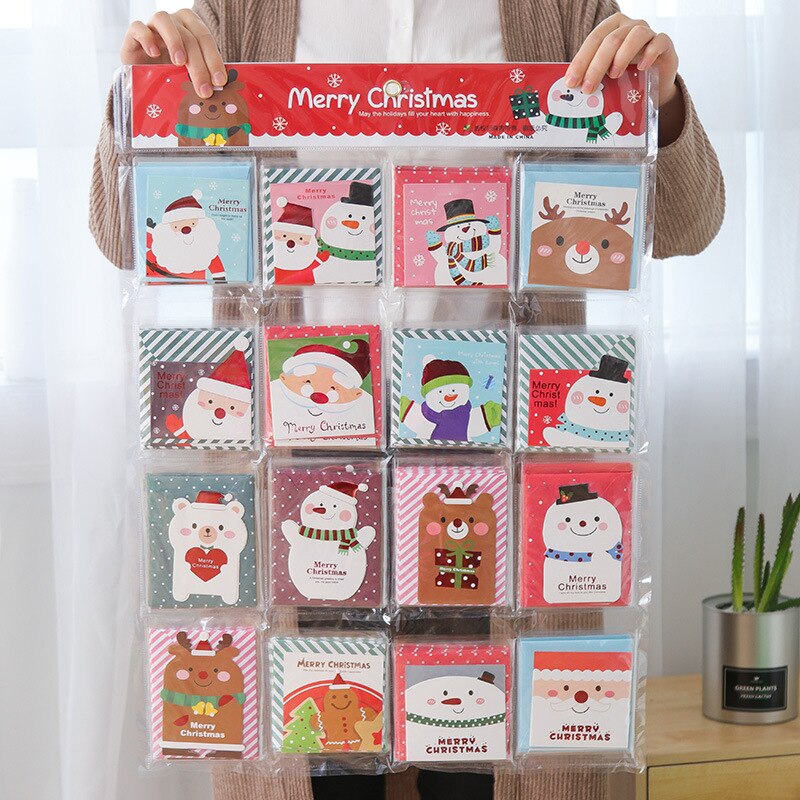 8 stks/partij Mini Cartoon Kerst Wenskaarten Bericht Postkaart met Envelop Willekeurige Patroon DV008