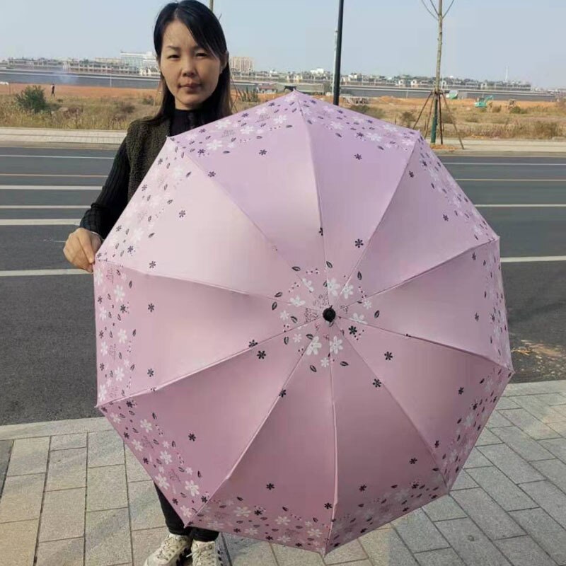 10 k plus størrelse kvinder solrig og regnfuld paraply tre-foldet sort belægning solcreme uv parasol vindtæt stærk regn paraply: 07