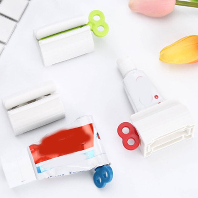 1pc multifunctionele tandpasta dispensers, gezichtsreiniger knijpers, rollende tandpasta knijpertubes, badkameraccessoires