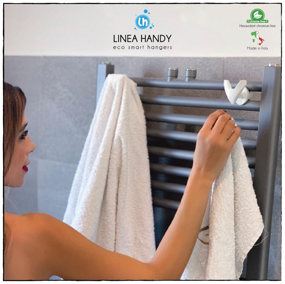 4 pezzi Coppia di appendini "Vip" per radiatori scaldasalviette. Innovativo porta asciugamani, lo monti in 30 sec. (senza fori sulle piastrelle, niente colla necessaria)