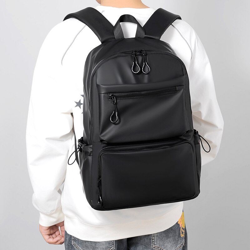 A 14 Inch Men's Backpack Large Capacity Travel Leisure Solid Color Pu Computer Backpack Men And Women Students Schoolbag