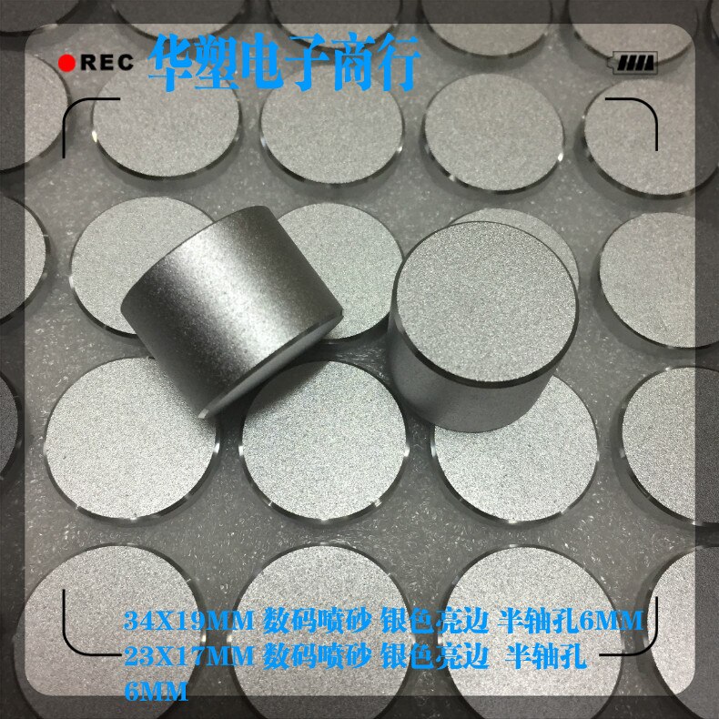 Silver sandblästring ljus sida (halva skaft) aluminiumlegeringsratt bilnavigeringsvolym justering cd kodarlock 34 x 19mm