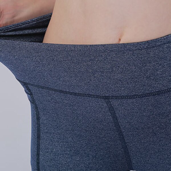 Yogashorts med hög midja för löparbikershorts för kvinnor med fickor