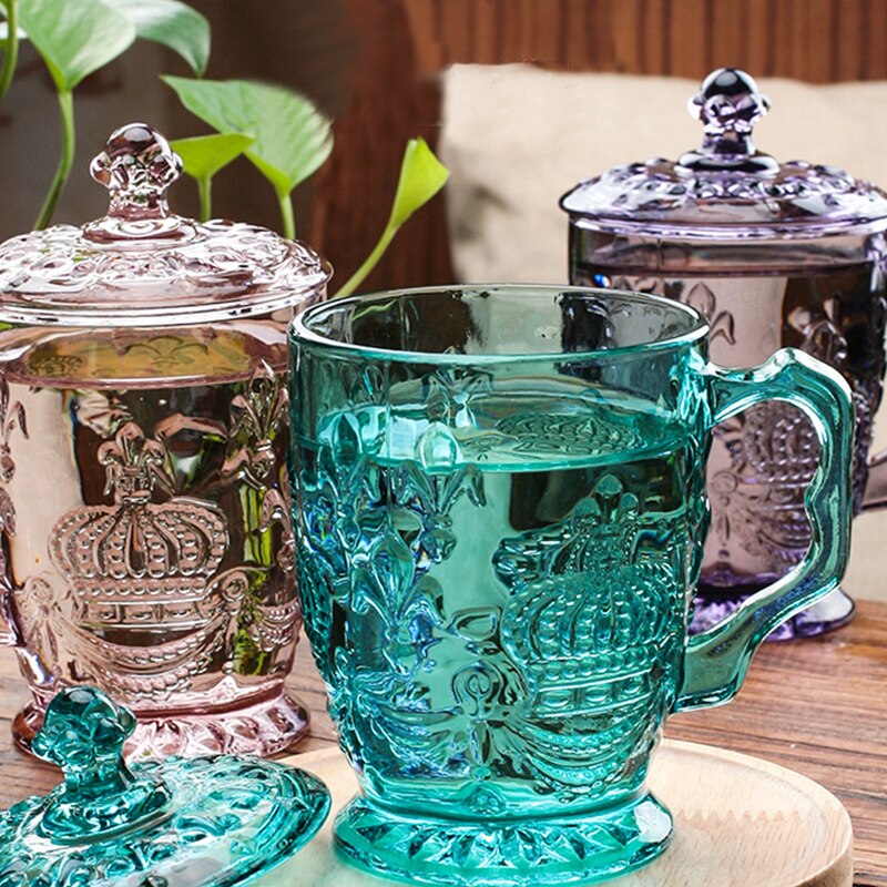 Präglat glas kopp bältesskydd glas hushåll blyfri kristall blomma te kopp kung hatt präglad glas lock mugg kopp