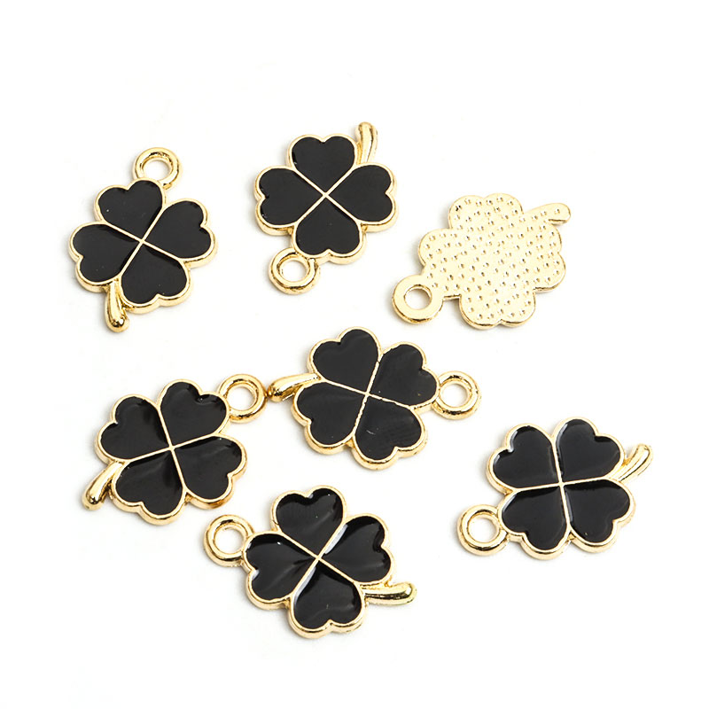 Dopamina trébol de cuatro hojas esmalte encantos 20 piezas DIY collar pulsera pendientes llavero amuleto colgantes accesorios de creativos