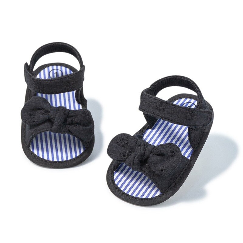 Letnie nowe dziecięce sandały dziewczęce wielokolorowe rzepy pompon kokardka antypoślizgowa miękka podeszwa noworodki dziecięce buciki dziecięce